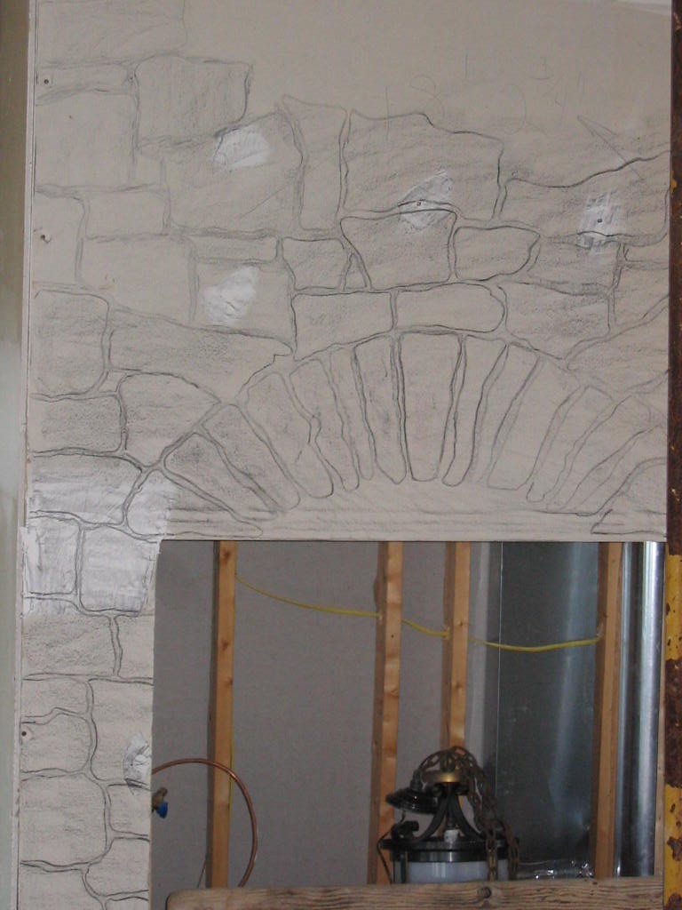 October 12, 2003 - we know the fireplace wont be done when we move in so Gus worked on the prototype!