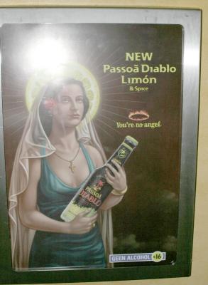 I found this poster on the inside of the stall door in the ladies room at the diner where we stopped for a witbier (white beer).  An advertisement for 'geen alcohol' had this angelic image of a Spanish madonna figure with a comment you're no angel.  The halo is part reflection from my camera flash.