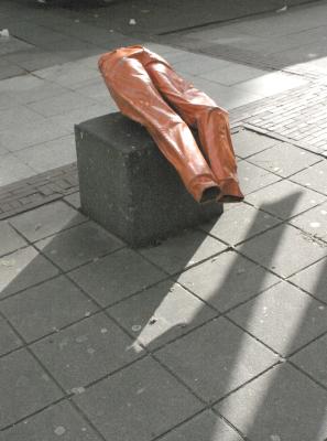 Pants statue under shadow of pants