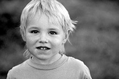 Isaac
This is Isaac, our next-door neighbor.  He comes over to play with my three boys just about every day.  He also loves to have his picture taken.  I hope some of that will rub off on my kids!