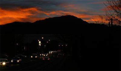 I was working in my woodshop on a commissioned project that is due soon.  I usually go to the Overlook at Palmer Park to get shots like this, but I don't have time tonight.  I stepped outside my shop, fired a couple, and went back to work.  I finished the project at 3:00 am, in time for a 10:30 am delivery!