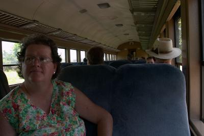 My sister Kathy on the short exhibition train ride. The temperture was in the mid-90's and we'd walked all over the museum grounds and over into town to get some lunch, so we were both a bit sweaty. No AC on this train, but we got a nice breeze as the train moved.