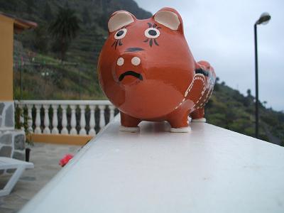 piggy bank on the balustrade