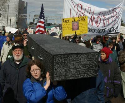 Coffin listing names of Dead US Soldiers in Iraq.jpg