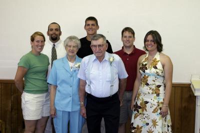 Doris, Paul, and the grandchildren