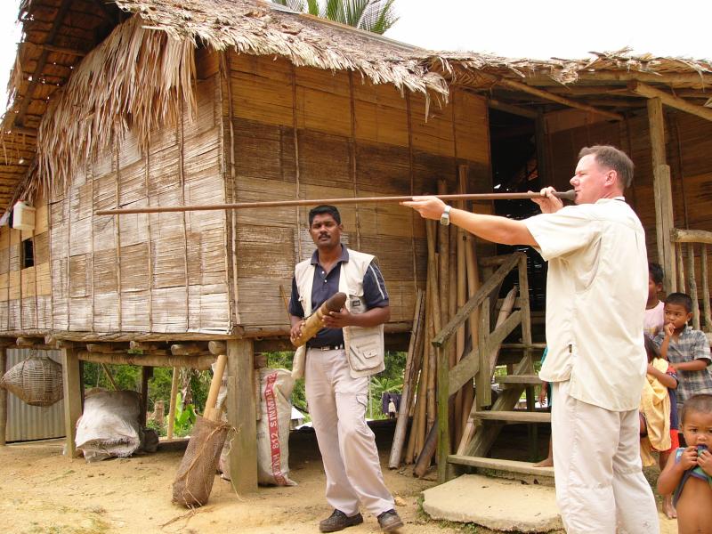 Peter tries out a blowpipe