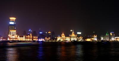 The famous Bund at night with river traffic