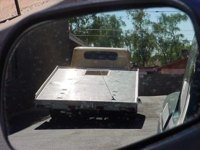 reflection of the Chevrolet custom car hauler