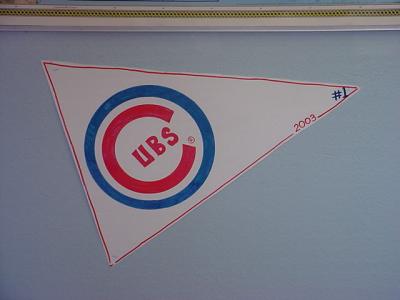 Cubs banner at Bill's barber shop