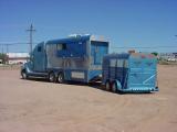 big rig Totor Home sleeper trailer on the back
