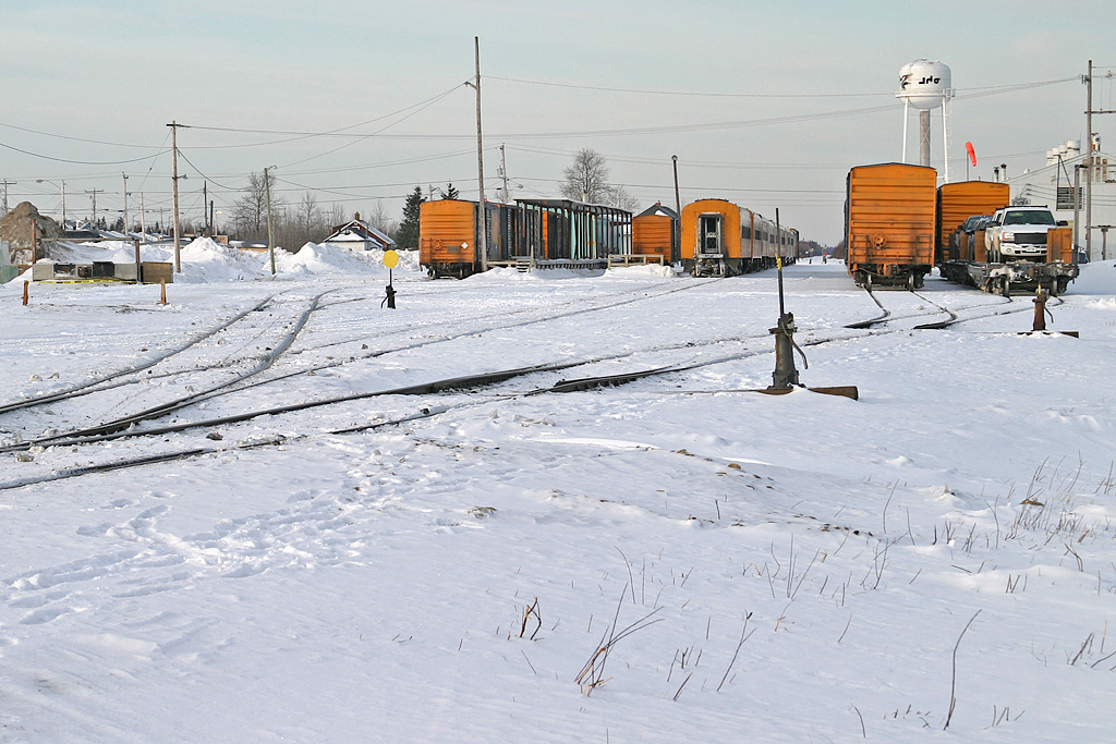 Passenger train with two sections of freight to the right