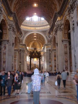 Woman praying near the entrance