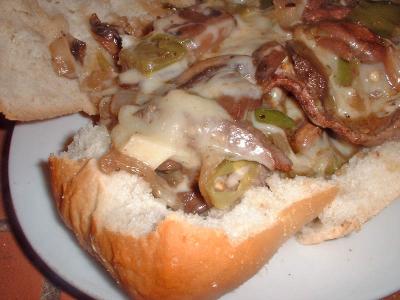 mushroom onion pepper cheesesteak sandwich