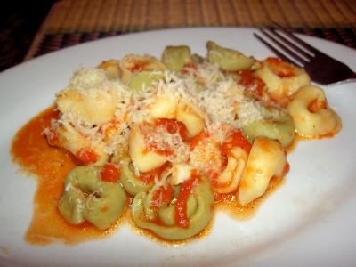 tortellini with tomato sauce and Parmesan cheese