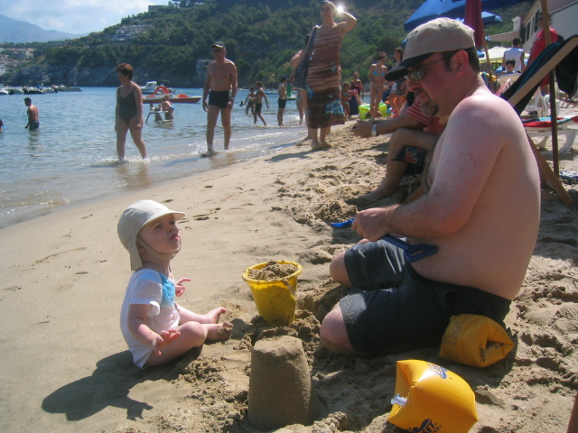 Sean teaching Dad to build a castle
