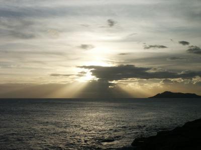 Muted sunset off Diamond Head from Spitting Caves (Portlock)