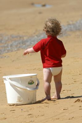 Baby with bucket