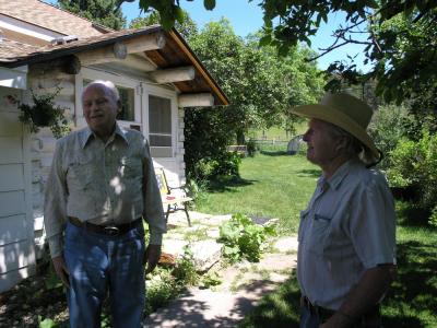 Ed and Marc in front of the old ranch house. Parts of the structure are original log construction from the 1800's, sound as a nut and good for another hundred years.