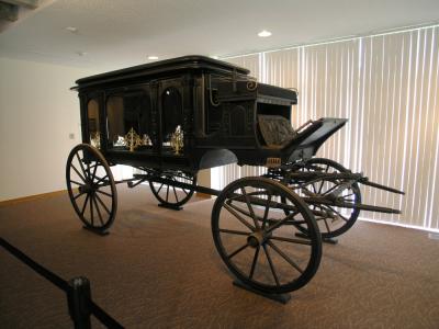 This fine old horse-drawn hearse carried Charlie Russell's body on its last journey.