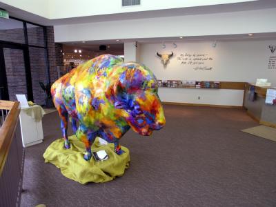 Great Falls has a number of painted fiberglas bison scattered about town to promote the city. This one graces the museum lobby.