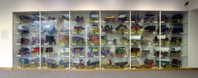 One large wall cabinet houses an impressive collection of miniature wagons.