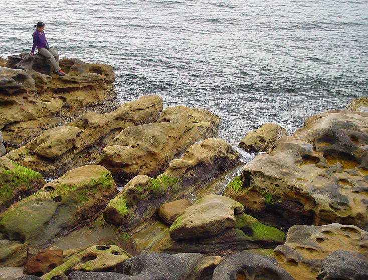 Girl on rocks* by Alec Ee