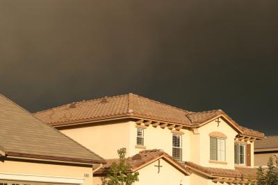 Smoke over neighbor's roof