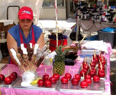Candy apple vendor at 6th ave street fair