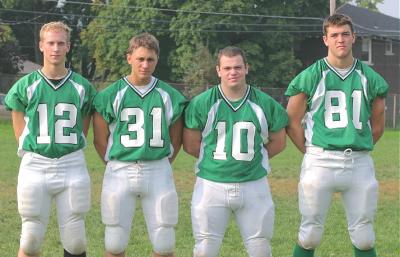 Varsity Football Captains Mike Petrick, Jeff Strong, Josh Rebello, Sam Thomas