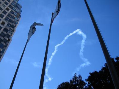 TransAmerica Flags showing one of the Blue Angels' smoke trails