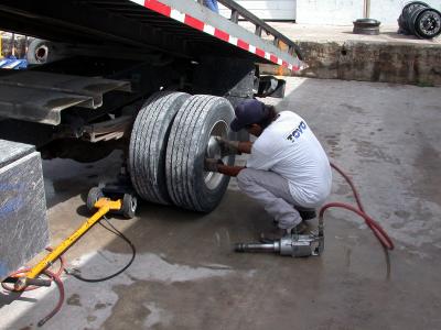 Changing tires on the GMC 6500 requires serious tools