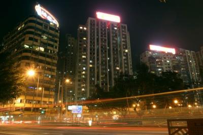 Neon light ad on top of residential buildings.jpg