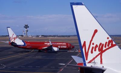 VH-VOF  Virgin Blue B737-800  Sydney control tower.jpg