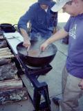 Frank Eatherly and Jason Ayers cooking beans. 2003