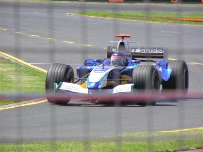Jacques Villeneuve driving a Sauber