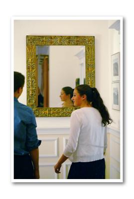 ...'daughter and friend check themselves out in the hall mirror....(teenagers, kids)