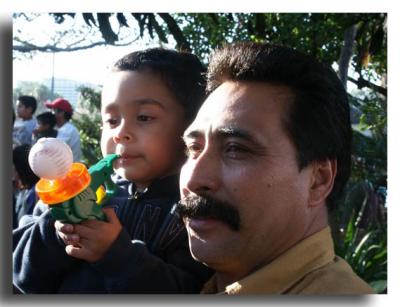 Father and Son Enjoy the Show
