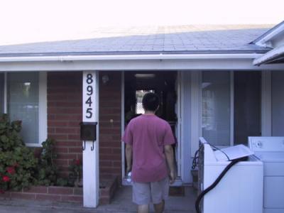 Tony entering the new house.jpg