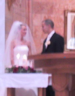 Ronnie and Maria Lighting the Candles 2.jpg