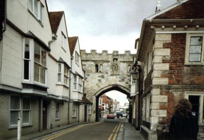 Salisbury: The cathedral gate leading to busy High Street.