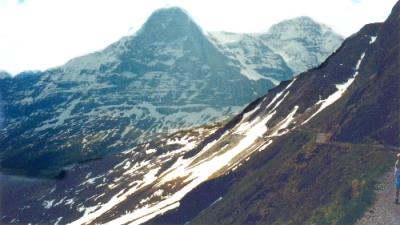 View of the Alps while on the trail from Mannlichen to Kleine Scheidegg. The trail is seen on the right side.