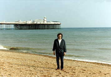 Richard on the beach in Brighton. The Palace Pier is in the background.