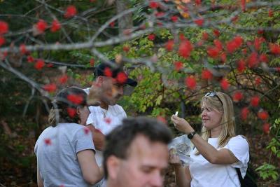 Beverly conducting communion services in the woods.