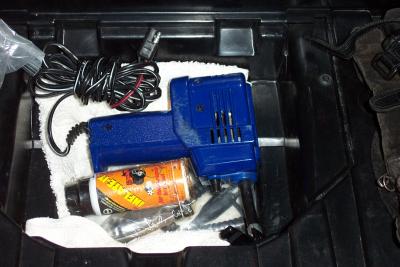 I have a portable air compressor in the trunk with a Radio Shack connector on the end of it so I can plug it into my battery