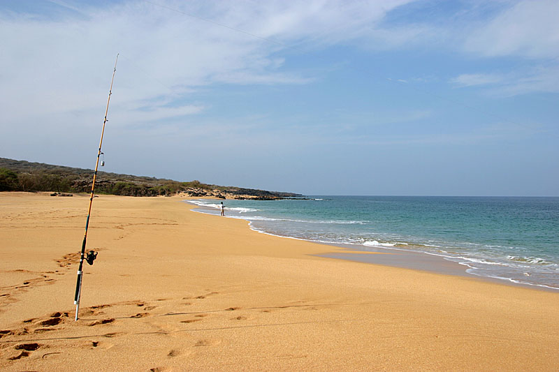 Polihua Beach Fisherman