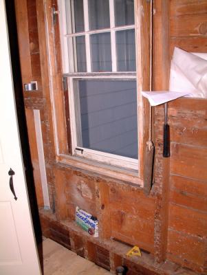 Bathroom window.  Window is in very good shape and will be reused.  A new semi-recessed steem radiator will be installed.