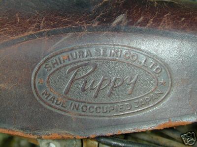 MADE IN OCCUPIED JAPAN The Sakura Seiki embossed leather racing seat on the right thigh contact point of a Road Puppy