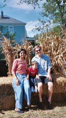Mama, Ben, and Papa in front of the corn maze (Norfolk, VA)