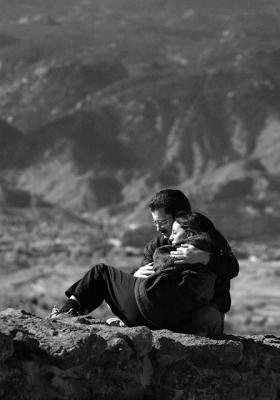 Just a Little Help
This reminds me of a shot in the Middle East somewhere...  This was just a couple enjoying a little quiet time in Palmer Park, with the Rocky Mountains in the background.