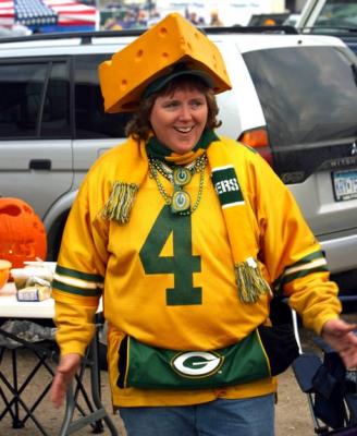 This is the typical attire of a Green Bay Packer Football Fan. This is why they are called cheese heads.